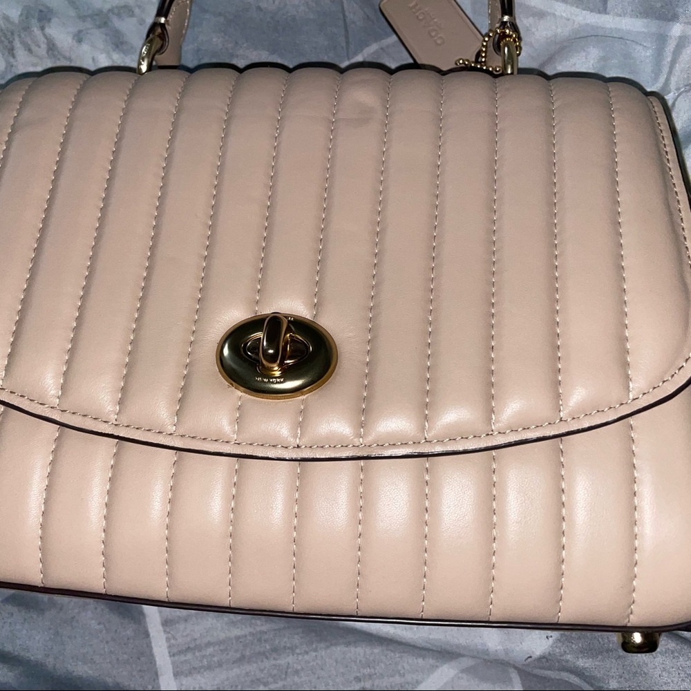 2562 tilly top handle Taupe Coach bag.